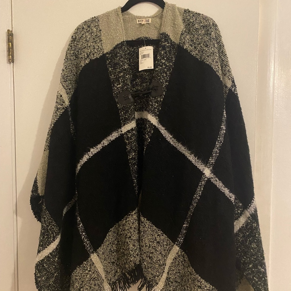 NWT black, grey, white poncho. Goes with everything!